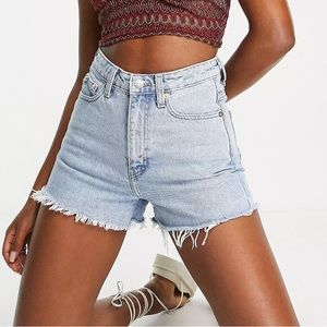 Distressed hem denim shorts
